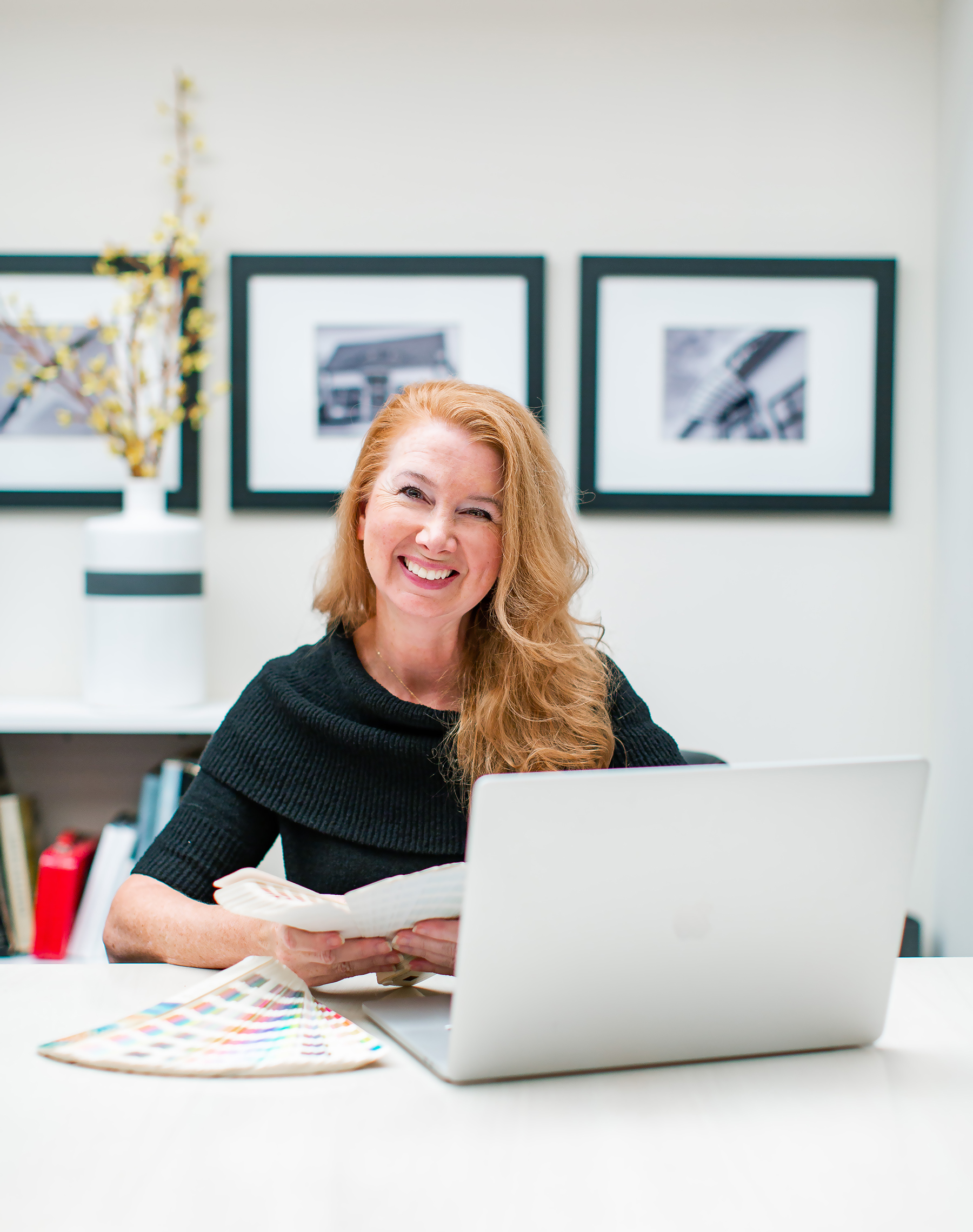 Tracey Albrecht at her computer in her office